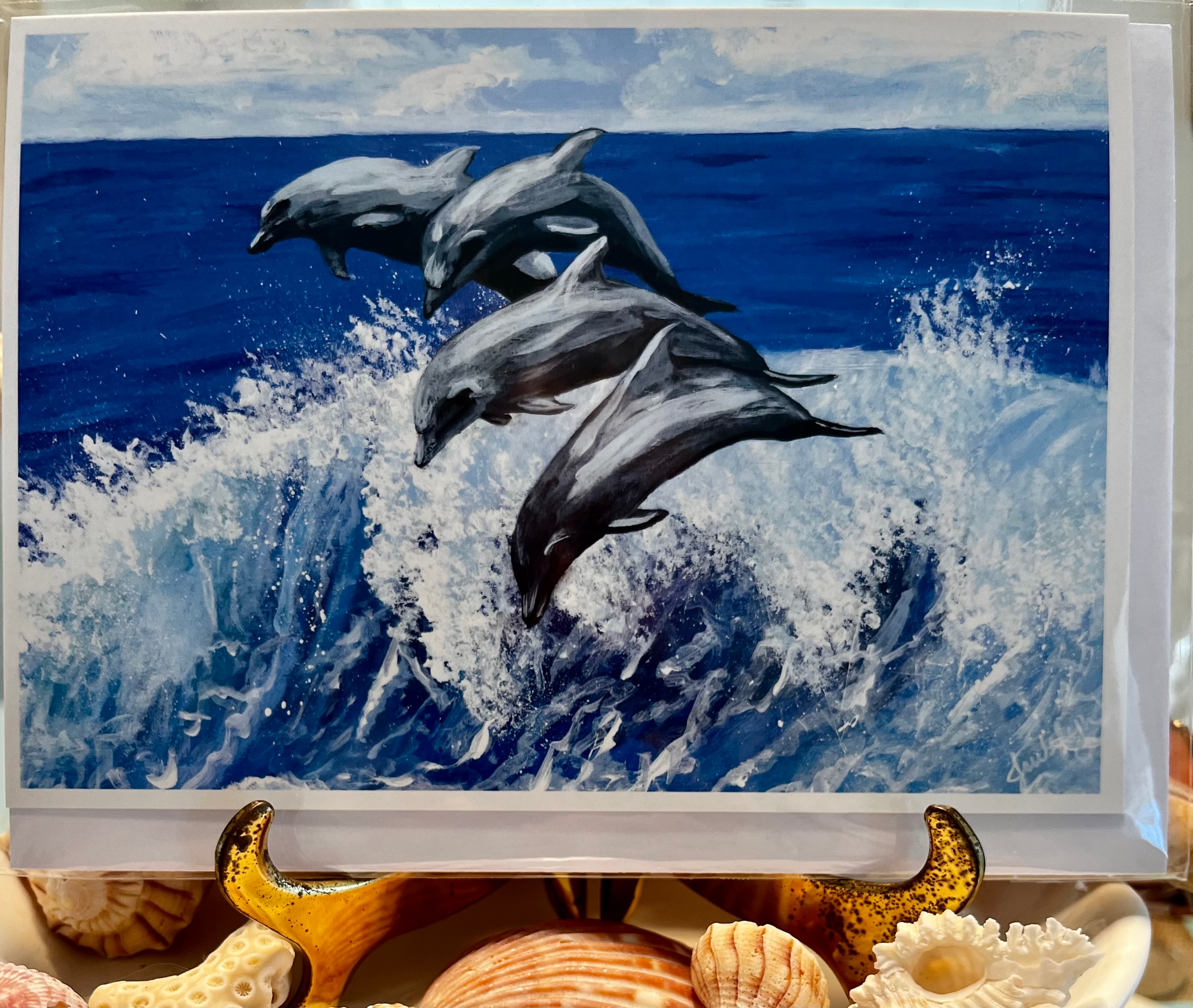 Dolphins Dancing on the Waves